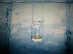 Suspension of experimental quartz powder: a) before suspension